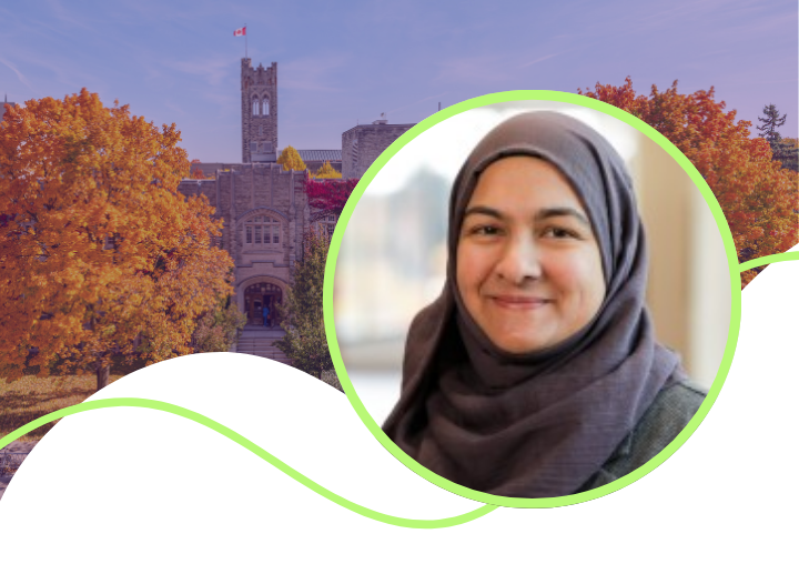 A photo of Shahin smiling wearing a purple hijab
