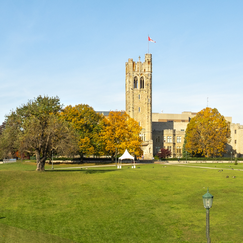 Western University's main campus during the fall, with leaves changing colour on the trees.