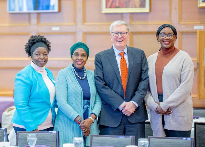 Black faculty members pose with President Alan Shepard at a Black Faculty and Staff Luncheon.